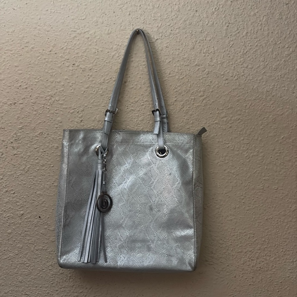 Sophisticated Silver Tote with Shimmery Finish and Tassel Charm